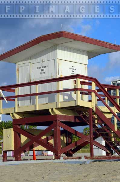 Brown, yellow and white lifeguard hut