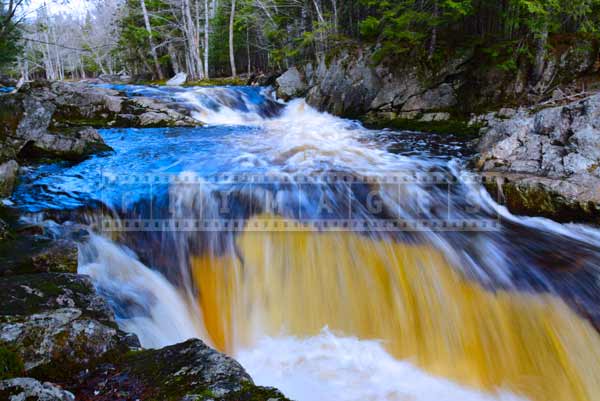 Strong flow of the river, whitewater and rapids, Millet Falls