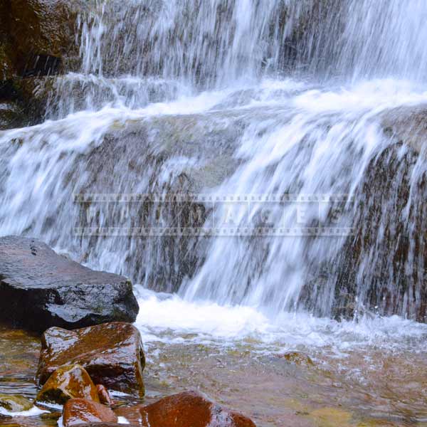 Conceptual abstrac images - water images showing static rocks and falling water