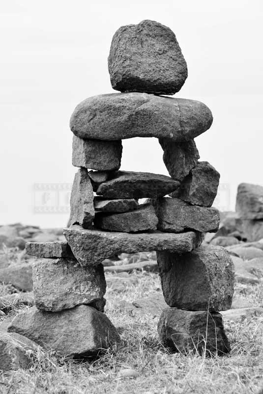 Inukshuk resembling human, abstract images