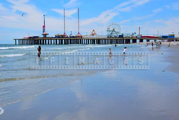 People at the beach and Steel Pier