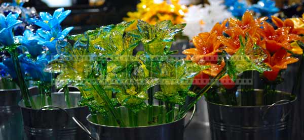Glass flowers - delicate still life gifts at museum glass market, travel images