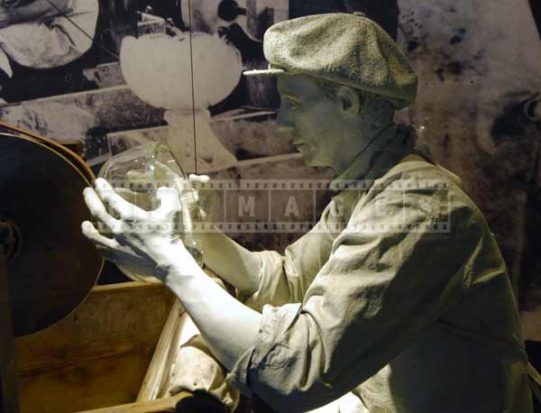 Man polishing crystal bowl, industrial images