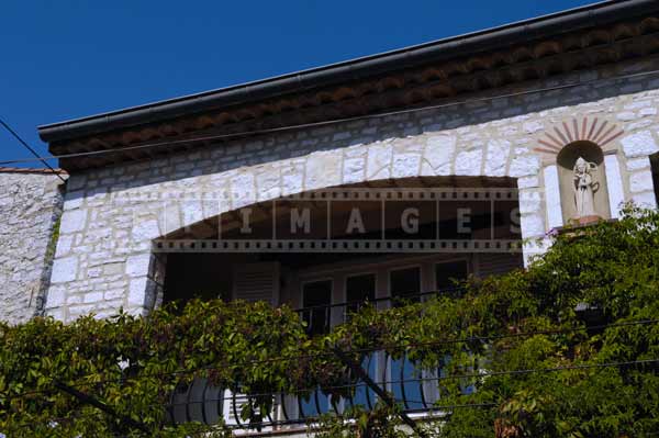 Balcony covered with green vines