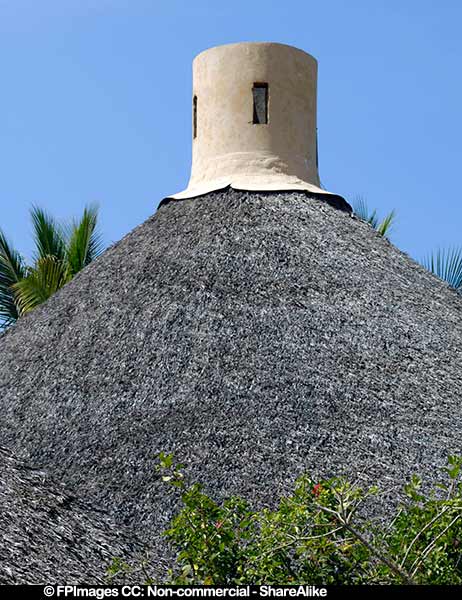 Chimney on top of palapa thatched roof, architectural photos