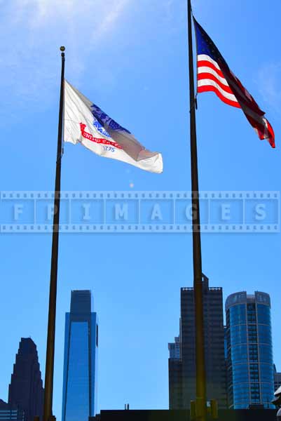 Philadelphia cityscapes with flags and tall buildings