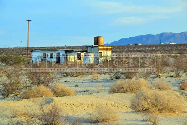 Houses are spread out in the desert, landscape photography