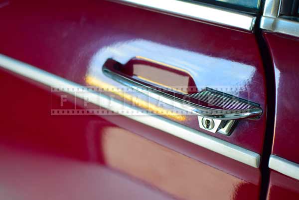 Chrome door handle, industrial car design detail 