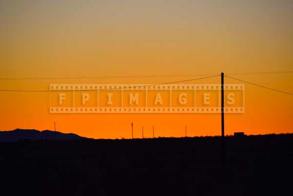 birght orange sky color in the desert at sunrise