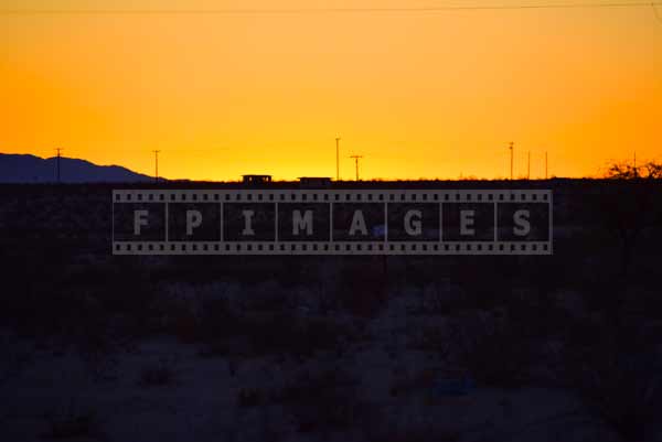 Contracting yellow skies and black desert, sunrise nature images