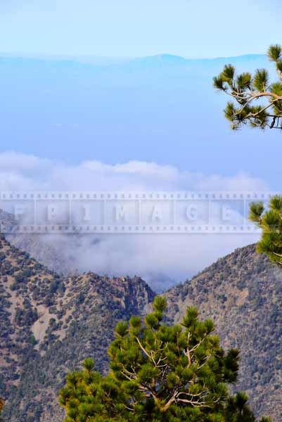 Mountain landscape - Clouds below in the valley