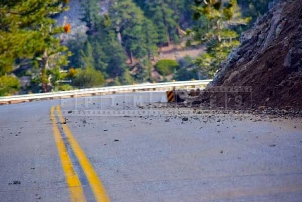 Falling rocks after the rainon mountain road