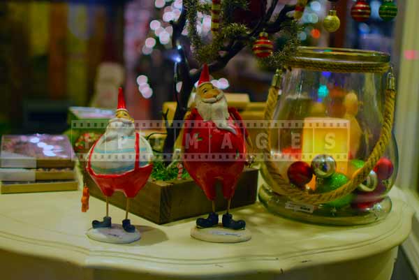 Two Santas, store window display