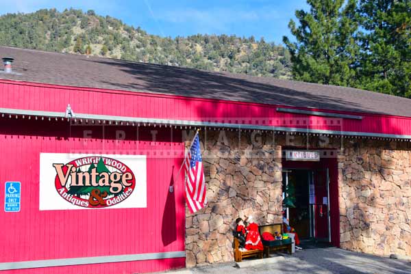 Pink building of antiques store, plan a trip to Angels Crest