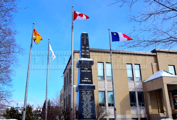 Canada, New Brunswick and Acadian flags at war memorial