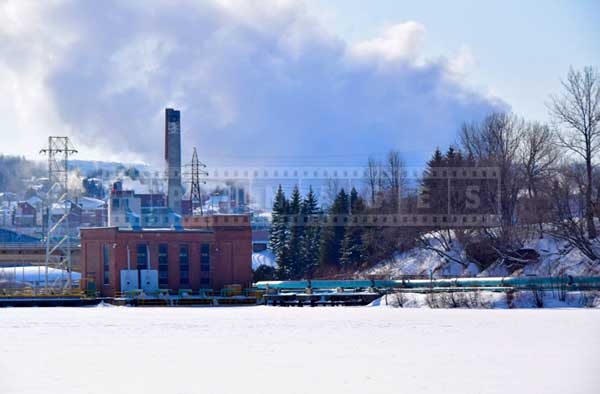 Steam rising from Madawaska paper mill