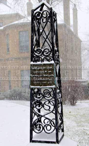 Wrought iron detail of the post 