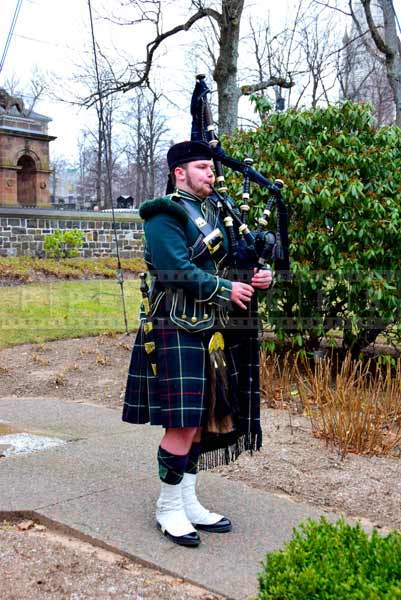 Bagpiper playing before the opening 