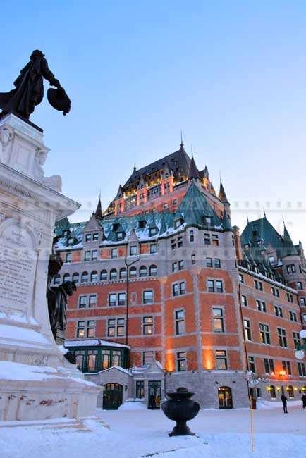 Monument to S. Champlain and Chateau Frontenac at sunset