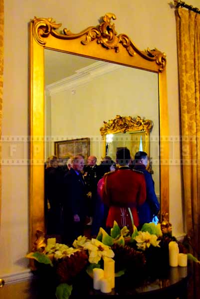 Mirror with golden frame and Christmas decorations