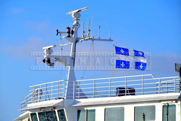 Main mast of the ferry flying Quebec flag