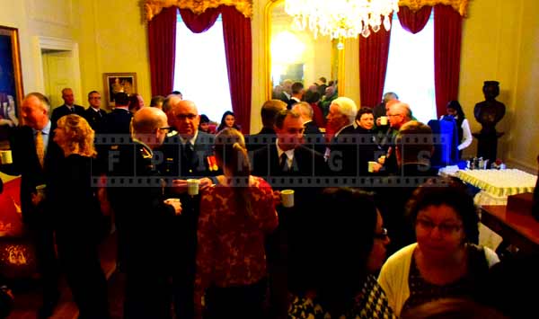 People enjoying reception at government house