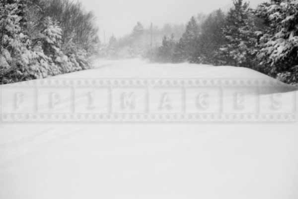 Local road completely covered with snow