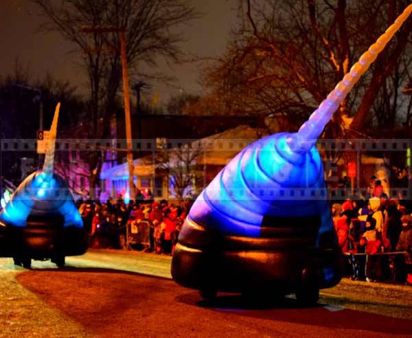 Futuristic sci-fi alien looking vehicle at Quebec city winter night parade