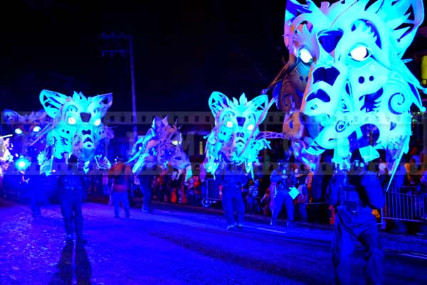 Quebec winter carnival street parade giant wolves by Sepaq