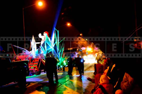 Night street parade with Bonhomme in Quebec City, Canada