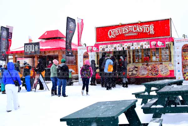 Line ups in winter to street food kiosks - barbecue and beaver tails