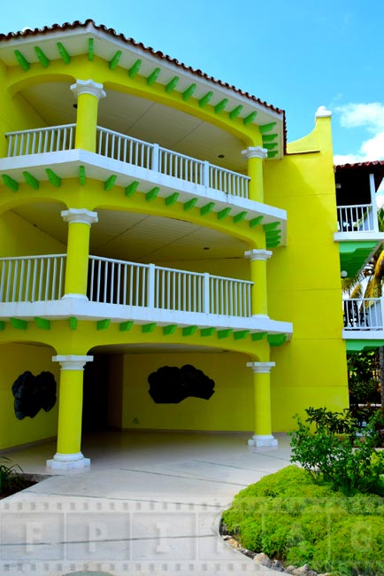 Yellow and green hotel building