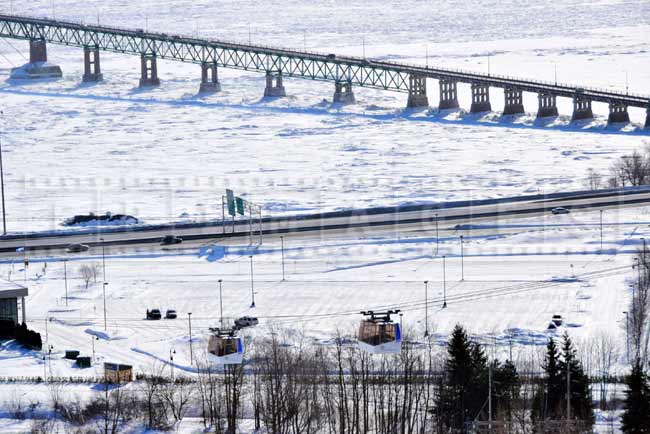 Two cable cars, 440 highway and bridge to Orleans island