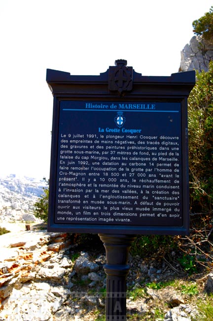 Information board dedicated to Henri Cosquer who discovered undersea cave