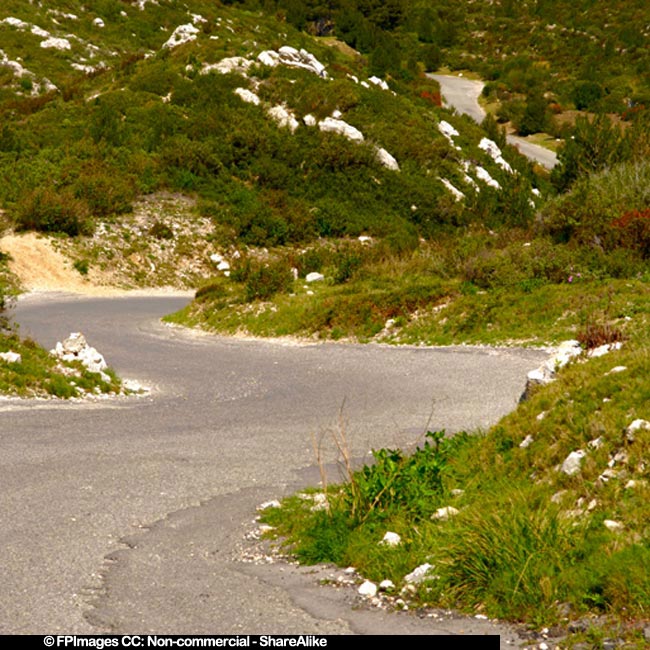 Hiking along the winding road to the scenic cove Sormiou calanque