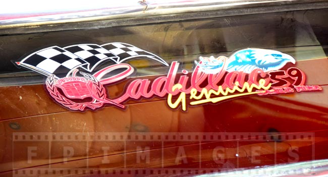 Genuine 59 Cadillac sign on the old car window