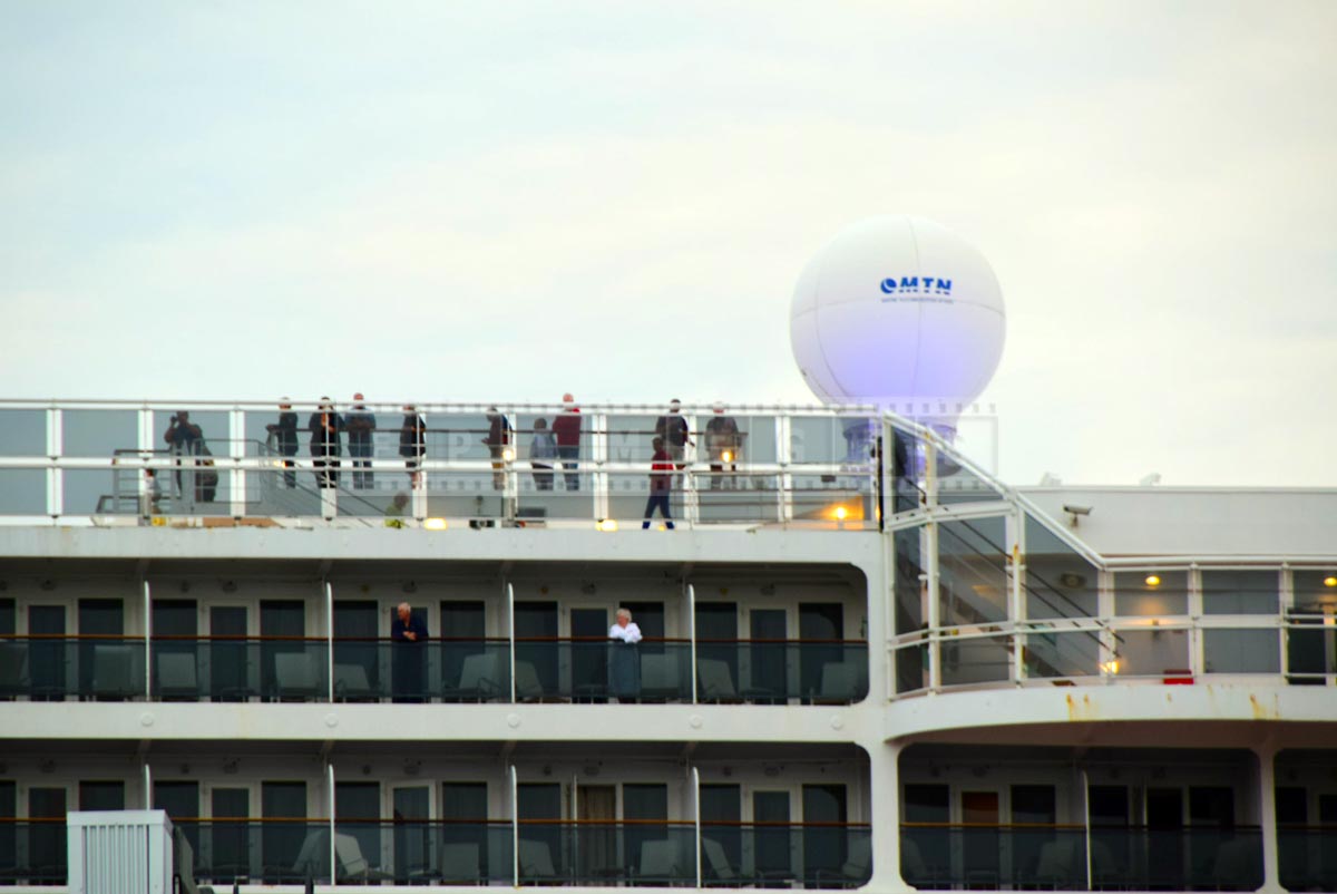 Passengers on decks of Queen Mary 2 cruise ship