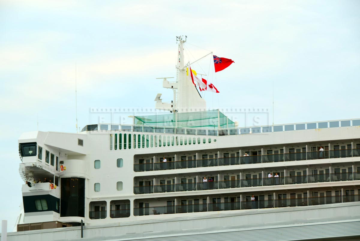 Main mast with flags of QM2, Cunard line flagship