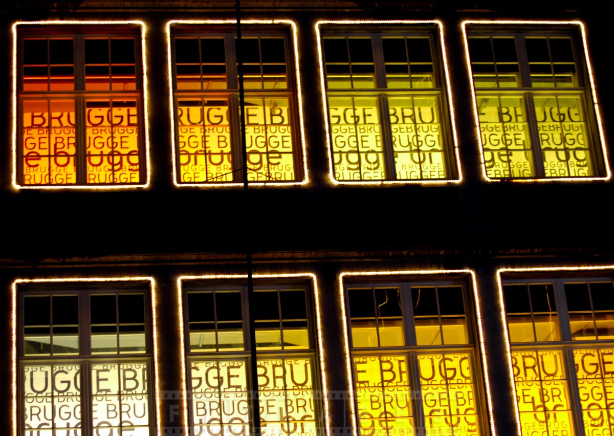 Windows decorations in Market square with the name of the town in Flemish - Brugge