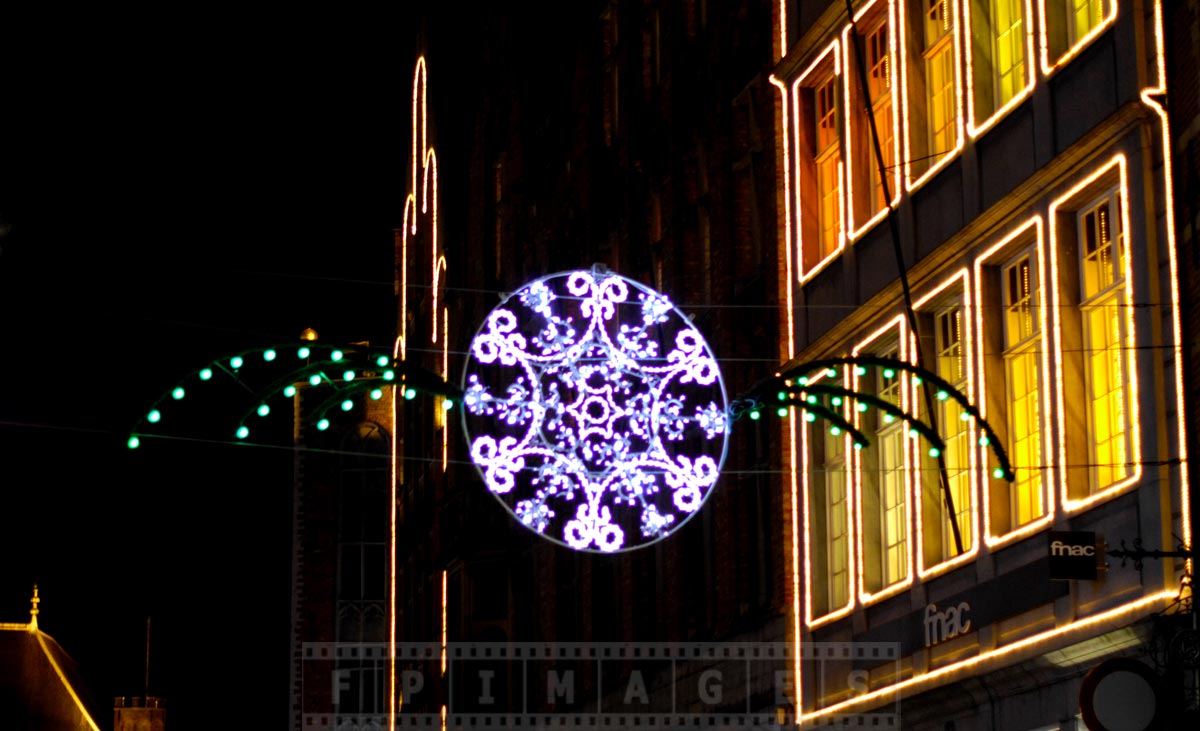 Outdoor lights in old Bruges make it very pretty at night