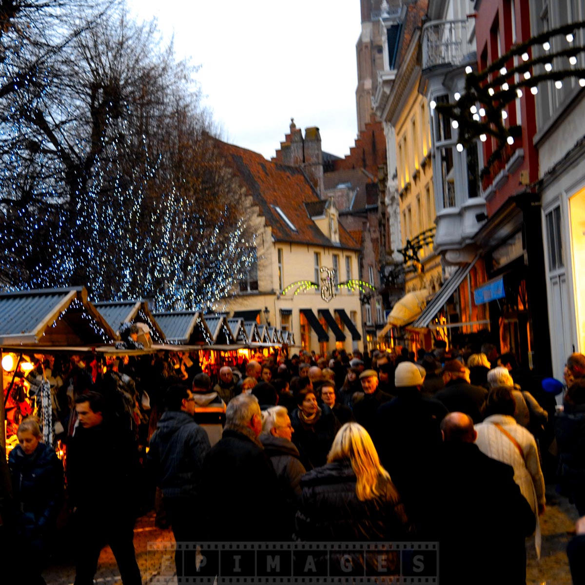 Cute Bruges street with lots of shops and restaurants