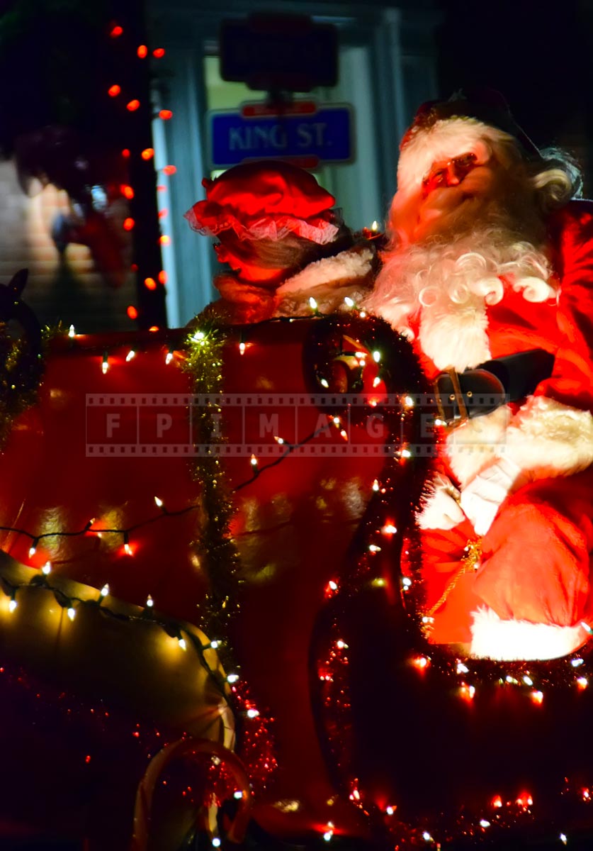 Santa and his sleigh at the night xmas parade
