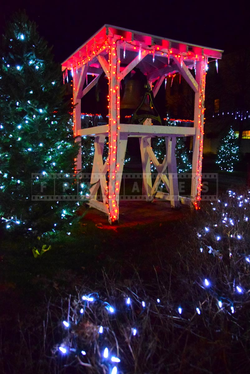 Old bell and outdoor Christmas decorations