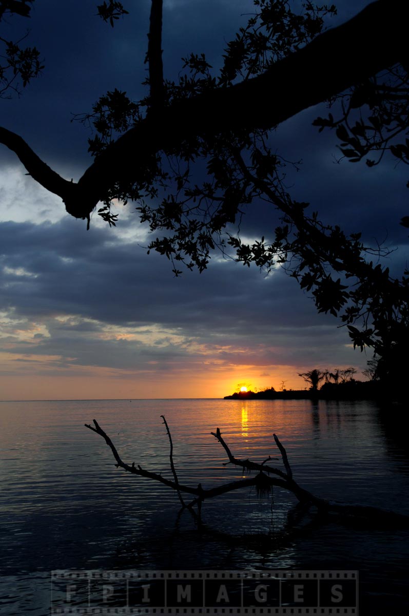 Amazing tropical sunset over Bloody Bay