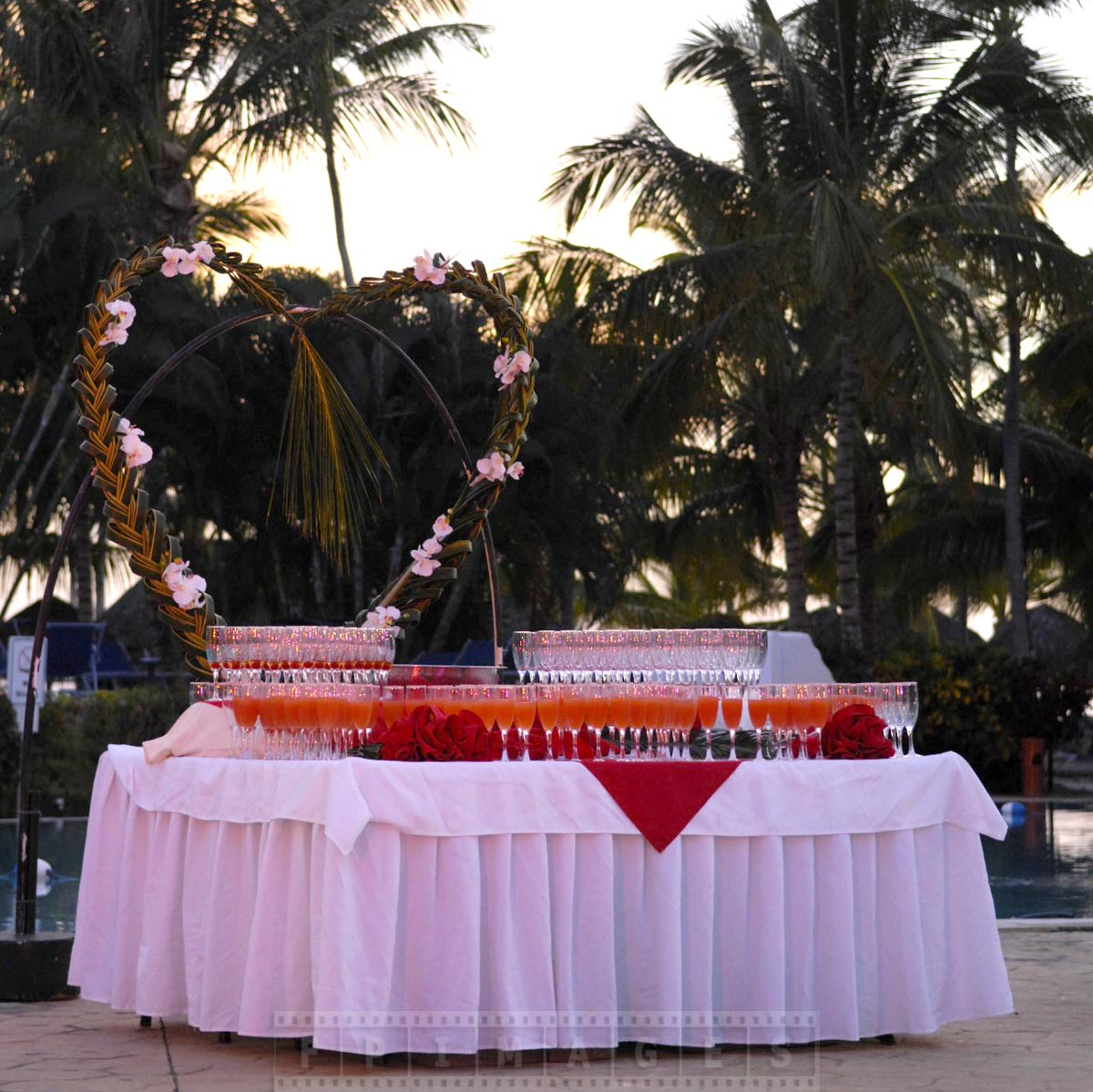 Champagne and drinks table decorated with a heart symbol