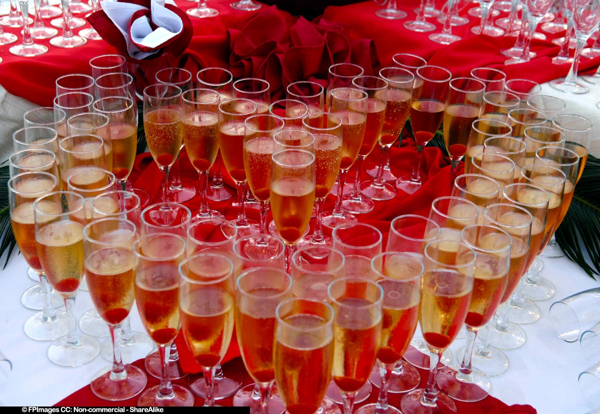 Champagne glasses arranged in the shape of heart for Valentines day