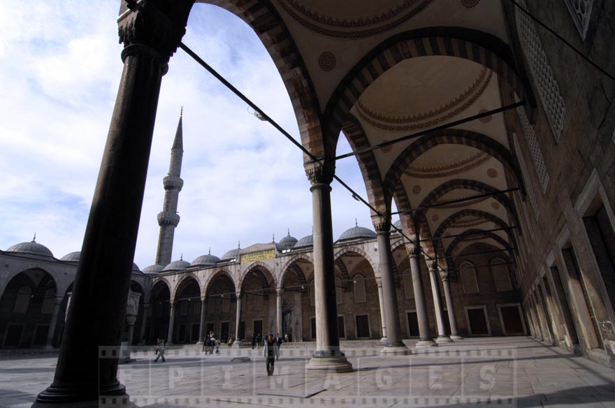 Large courtyard and elegant arches