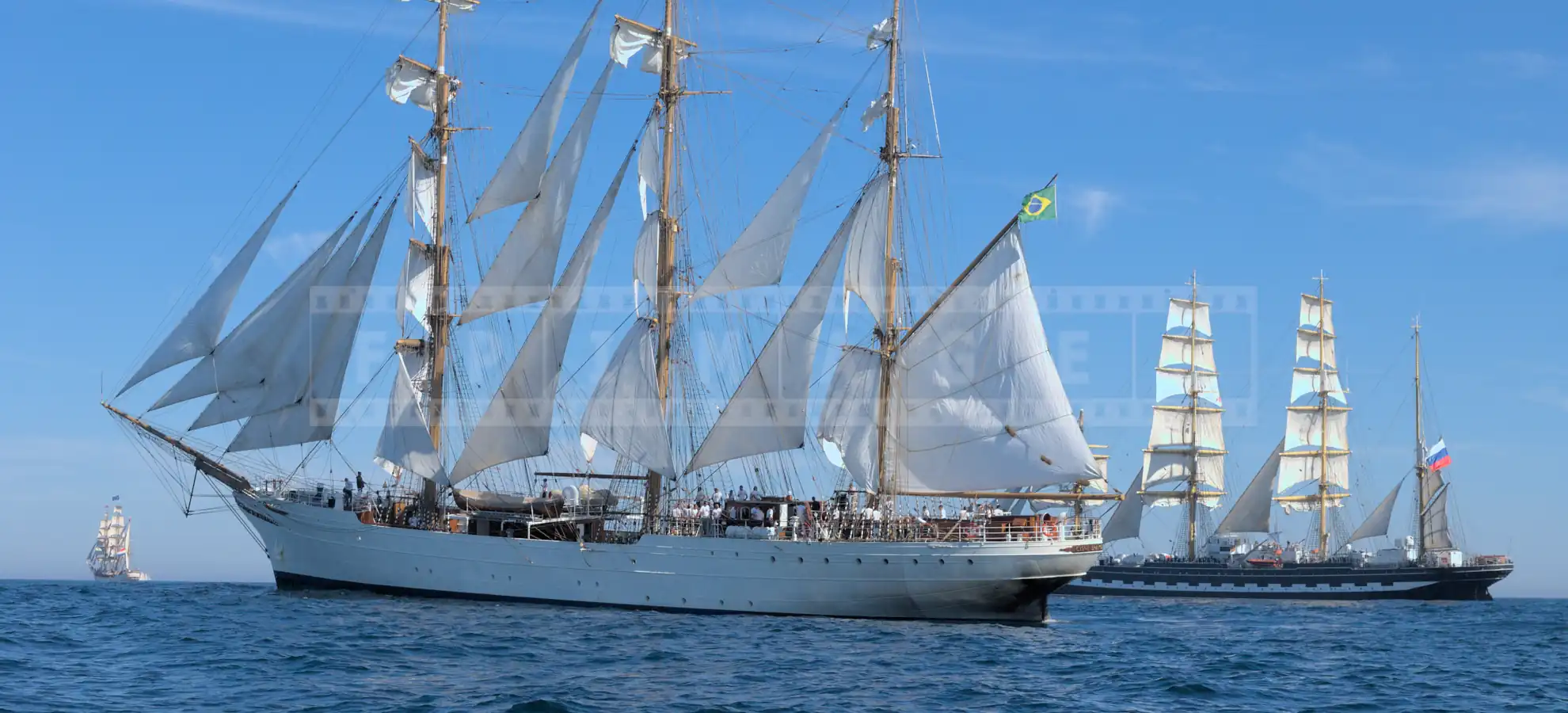 sailing ships Sagres, Kruzenstern and Europa at the start of tall ships race in Halifax