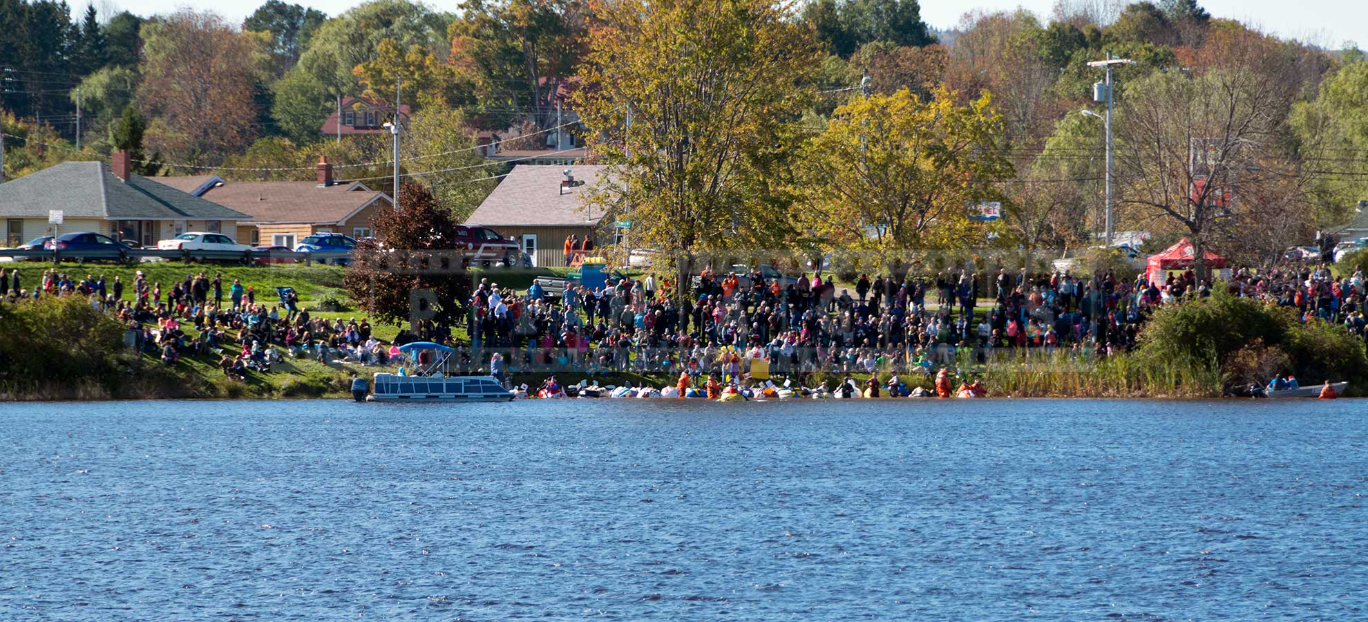 pumpkin boats lined up at the start of the race in Windsor, Nova Scotia