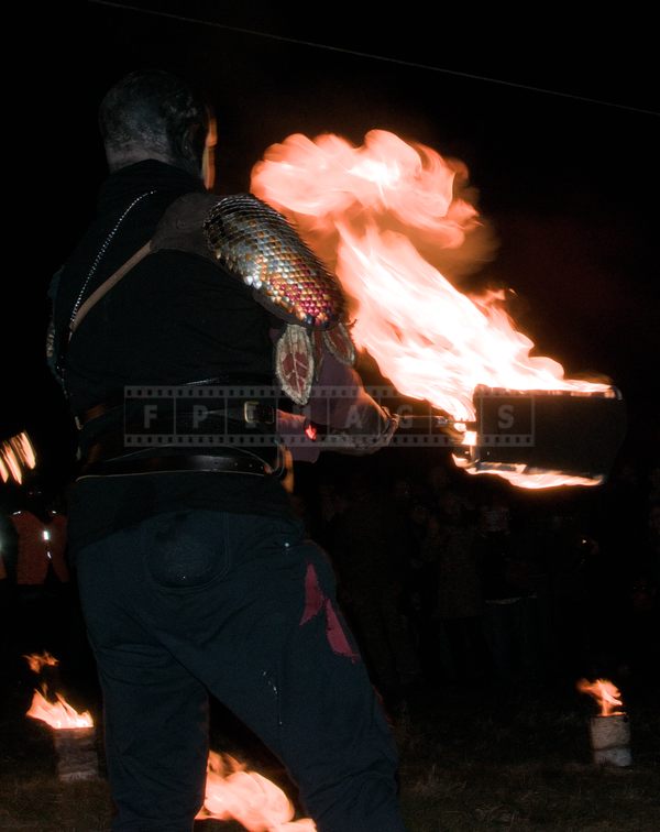 Huge fire staff with flames at night